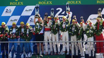 LE MANS, FRANCE - JUNE 18:  The Jackie Chan DC Racing Oreca team (C) of Oliver Jarvis, Thomas Laurent and Ho-Pin Tung celebrates winning the LMP2 class during the Le Mans 24 Hours race at the Circuit de la Sarthe on June 18, 2017 in Le Mans, France.  (Photo by Ker Robertson/Getty Images)