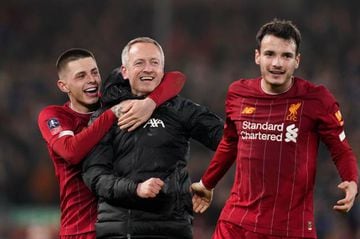 Liverpool U23 coach Neil Critchley celebrates with the players