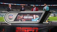 ESPN Monday Night Football broadcasters Scott Van Pelt (left), Ryan Clark (left center), Marcus Spears (right center), and Robert Griffin III (right) before a game