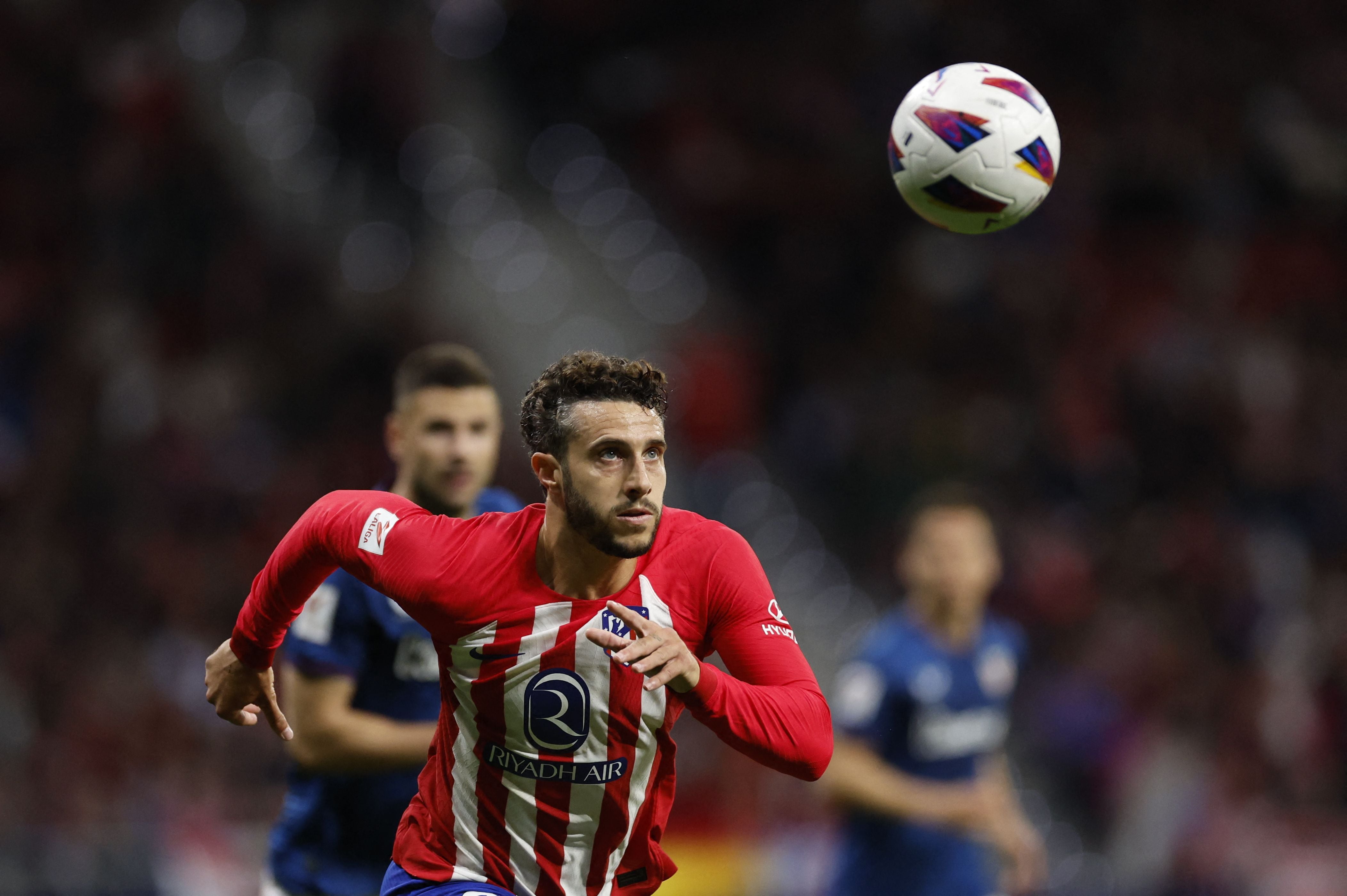 Atletico Madrid's Spanish defender #22 Mario Hermoso eyes the ball during the Spanish league football match between Club Atletico de Madrid and Athletic Club Bilbao at the Metropolitano stadium in Madrid on April 27, 2024. (Photo by OSCAR DEL POZO / AFP)