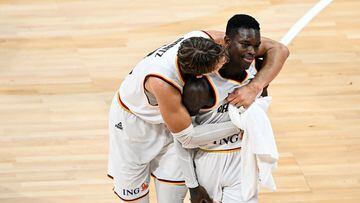 Germany's Moritz Wagner and Dennis Schroder celebrate their team's victory in the FIBA Basketball World Cup quarter-final match between Germany and Latvia at the Mall of Asia Arena in Manila on September 6, 2023. (Photo by SHERWIN VARDELEON / AFP)