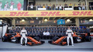 Formula One F1 - Brazilian Grand Prix 2017 - Sao Paulo, Brazil - November 12, 2017  McLaren&#039;s Fernando Alonso and Stoffel Vandoorne pose with their team ahead of the Brazilian Grand Prix  REUTERS/Ueslei Marcelino