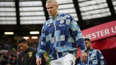 MANCHESTER, ENGLAND - JANUARY 14: Erling Haaland of Manchester City walks out onto the pitch prior to the Premier League match between Manchester United and Manchester City at Old Trafford on January 14, 2023 in Manchester, England. (Photo by Tom Flathers/Manchester City FC via Getty Images)