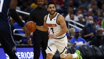 Dec 1, 2021; Orlando, Florida, USA; Denver Nuggets guard Facundo Campazzo (7) drives to the basket against the Orlando Magic during the first quarter at Amway Center. Mandatory Credit: Kim Klement-USA TODAY Sports