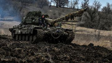 Ukrainian servicemen ride atop of a tank at a position near a frontline, amid Russia's attack on Ukraine, in Zaporizhzhia region, Ukraine March 16, 2023. REUTERS/Stringer
