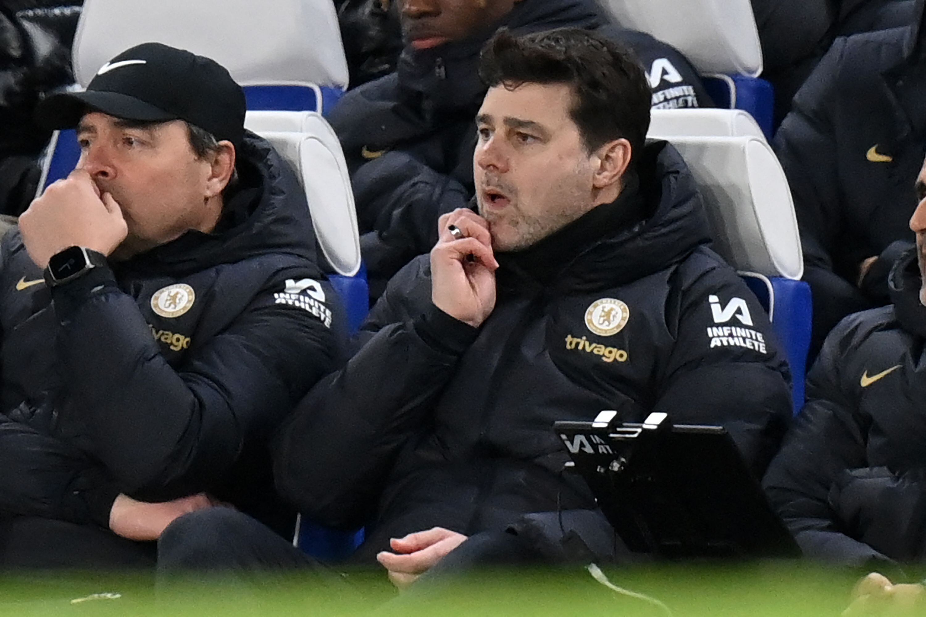 Chelsea's Argentinian head coach Mauricio Pochettino gestures in his seat during the English FA Cup fifth round football match between Chelsea and Leeds United at Stamford Bridge, in London, on February 28, 2024. (Photo by Glyn KIRK / AFP) / RESTRICTED TO EDITORIAL USE. No use with unauthorized audio, video, data, fixture lists, club/league logos or 'live' services. Online in-match use limited to 120 images. An additional 40 images may be used in extra time. No video emulation. Social media in-match use limited to 120 images. An additional 40 images may be used in extra time. No use in betting publications, games or single club/league/player publications. / 