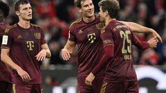 Bayern Munich's French defender Benjamin Pavard (L), Bayern Munich's German midfielder Leon Goretzka (C) and Bayern Munich's German forward Thomas Mueller celebrate during the German first division Bundesliga football match between FC Bayern Munich and Bayer 04 Leverkusen in Munich on September 30, 2022. - DFL REGULATIONS PROHIBIT ANY USE OF PHOTOGRAPHS AS IMAGE SEQUENCES AND/OR QUASI-VIDEO (Photo by CHRISTOF STACHE / AFP) / DFL REGULATIONS PROHIBIT ANY USE OF PHOTOGRAPHS AS IMAGE SEQUENCES AND/OR QUASI-VIDEO (Photo by CHRISTOF STACHE/AFP via Getty Images)