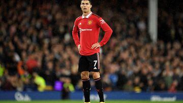 (FILES) In this file photo taken on October 09, 2022 Manchester United's Portuguese striker Cristiano Ronaldo looks on during the English Premier League football match between Everton and Manchester United at Goodison Park in Liverpool, north west England. - Cristiano Ronaldo's controversial second spell at Manchester United is to end with "immediate effect", the Premier League giants announced on November 22, 2022. The Portugal forward appeared to be on his way out of Old Trafford following a recent television interview in which he said he felt "betrayed" by the club and had no respect for new manager Erik ten Hag. (Photo by Oli SCARFF / AFP) / RESTRICTED TO EDITORIAL USE. No use with unauthorized audio, video, data, fixture lists, club/league logos or 'live' services. Online in-match use limited to 120 images. An additional 40 images may be used in extra time. No video emulation. Social media in-match use limited to 120 images. An additional 40 images may be used in extra time. No use in betting publications, games or single club/league/player publications. / 