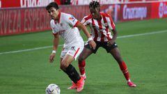 SEVILLE, SPAIN - MAY 03: Marcos Acuna of Sevilla battles for possession with Nico Williams of Athletic Club during the La Liga Santander match between Sevilla FC and Athletic Club at Estadio Ramon Sanchez Pizjuan on May 03, 2021 in Seville, Spain. Sportin