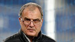 (FILES) Leeds United's Argentinian head coach Marcelo Bielsa walks along the touchline ahead of the English Premier League football match between Everton and Leeds United at Goodison Park in Liverpool, north west England on November 28, 2020. After several weeks of intense negotiations, Argentine Marcelo Bielsa was finally announced on May 15, 2023, by the Uruguayan Football Association (AUF), as the new coach of the national team. (Photo by Clive Brunskill / POOL / AFP) / RESTRICTED TO EDITORIAL USE. No use with unauthorized audio, video, data, fixture lists, club/league logos or 'live' services. Online in-match use limited to 120 images. An additional 40 images may be used in extra time. No video emulation. Social media in-match use limited to 120 images. An additional 40 images may be used in extra time. No use in betting publications, games or single club/league/player publications. / 