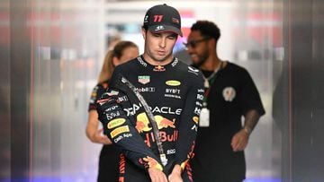 Red Bull Racing's Mexican driver Sergio Perez leaves his team garage after the third practice session ahead of the Singapore Formula One Grand Prix night race at the Marina Bay Street Circuit in Singapore on September 16, 2023. (Photo by MOHD RASFAN / AFP)