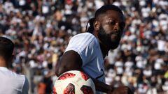 Olimpia player, Togolese Emmanuel Adebayor, warms up before the start of the Paraguayan Apertura football tournament derby against Cerro Porteno at the Manuel Ferreira stadium in Asuncion, on February 23, 2020. (Photo by NORBERTO DUARTE / AFP)
