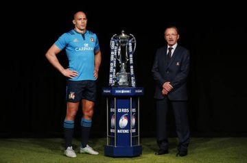 Italy captain Sergio Parisse and Italy Head Coach Jacques Brunel pose with the RBS Six Nations trophy.
