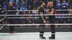 Roman Reigns y Goldberg en WWE.