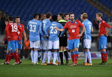 Referee Massimiliano Irrati suspends play for a few minutes because of racist chants from the Lazio fans