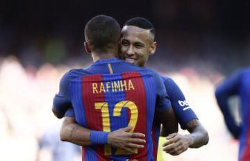 FC Barcelona's Rafinha Alcantara, back to camera, celebrates after scoring with his teammate Neymar during the Spanish La Liga soccer match between FC Barcelona and Deportivo Coruna at the Camp Nou in Barcelona, Spain, Saturday, Oct. 15, 2016. (AP Photo/M
