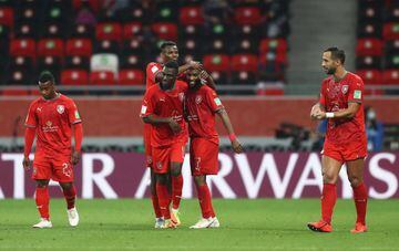 DOHA, QATAR - FEBRUARY 07: Almoez Ali of Al Duhail SC celebrates with teammates Mohammed Muntari and Ismail Mohamad after scoring their team's third goal during the FIFA Club World Cup Qatar 2020 5th Place match between Ulsan Hyundai FC and Al Duhail SC