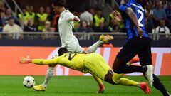 Bayern Munich's German midfielder Leroy Sane (up) fights for the ball with Inter Milan's Cameroonian goalkeeper Andre Onana (C) on his way to scoring a goal during the UEFA Champions League Group C football match between Inter Milan and Bayern Munich in Milan, on September 7, 2022. (Photo by MIGUEL MEDINA / AFP) (Photo by MIGUEL MEDINA/AFP via Getty Images)
