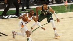 Jul 11, 2021; Milwaukee, Wisconsin, USA; Phoenix Suns guard Chris Paul (3) drives for the basket against Milwaukee Bucks forward Giannis Antetokounmpo (34) during the second quarter in game three of the 2021 NBA Finals at Fiserv Forum. Mandatory Credit: J