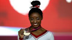Simone Biles claims record 13th world gold in Doha
