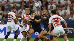 England's outside centre Joe Marchant catches the ball during the France 2023 Rugby World Cup Pool D match between England and Japan at Stade de Nice in Nice, southern France on September 17, 2023. (Photo by NICOLAS TUCAT / AFP)