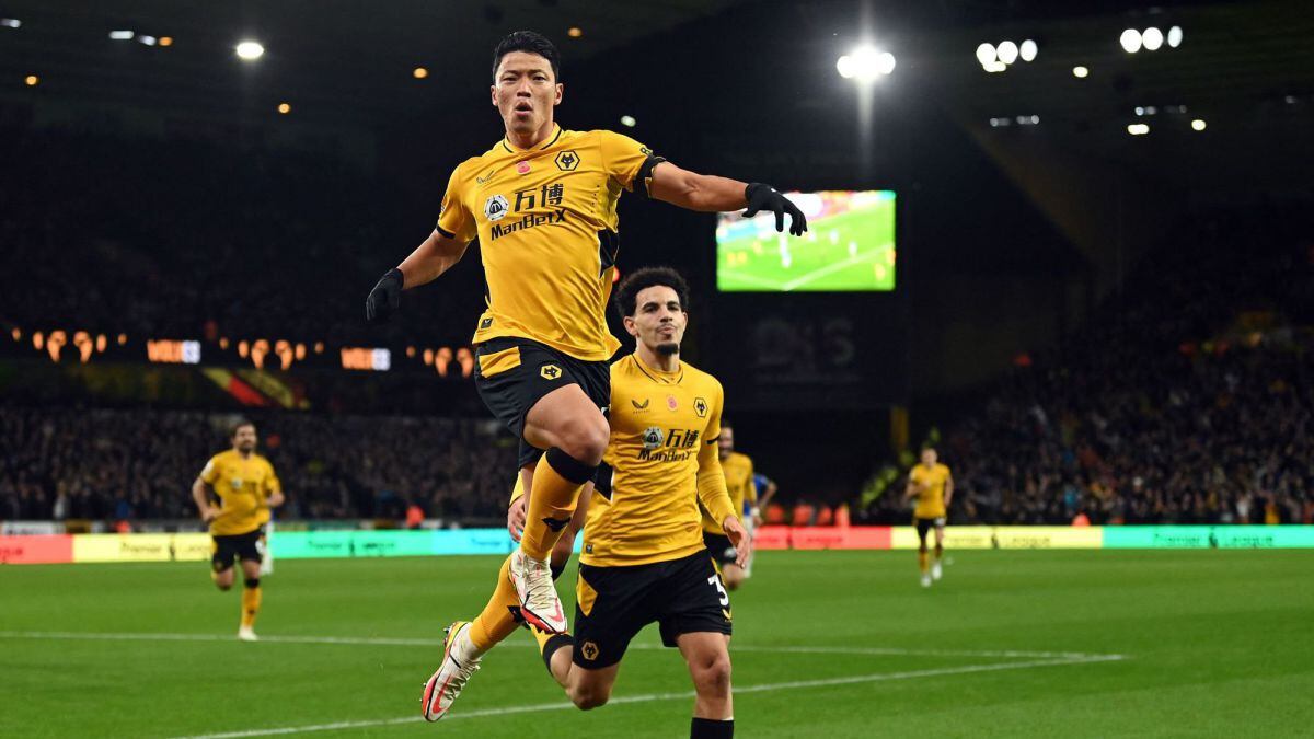 Wolverhampton Wanderers&#039; South Korean striker Hwang Hee-chan celebrates after scoring a goal that was later invalidated by the video assistant referee (VAR) during the English Premier League football match between Wolverhampton Wanderers and Everton 