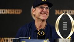 HOUSTON, TEXAS - JANUARY 08: Head coach Jim Harbaugh of the Michigan Wolverines reacts during the press conference after defeating the Washington Huskies during the 2024 CFP National Championship game at NRG Stadium on January 08, 2024 in Houston, Texas. Michigan defeated Washington 34-13.   Maddie Meyer/Getty Images/AFP (Photo by Maddie Meyer / GETTY IMAGES NORTH AMERICA / Getty Images via AFP)