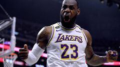 (FILES) In this file photo taken on March 08, 2020 LeBron James #23 of the Los Angeles Lakers celebrate his basket and LA Clippers foul during a 112-103 Lakers win at Staples Center in Los Angeles, California. NOTE TO USER: User expressly acknowledges and