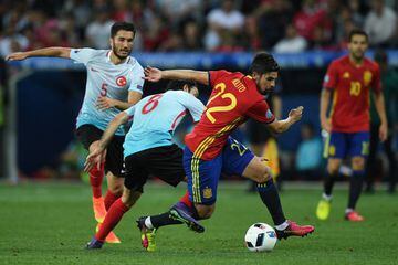 Selcuk Inan attempts to tackle Nolito during the EURO 2016 Group D match between Spain and Turkey at Allianz Riviera Stadium on June 17, in which Nolito was an integral part of a Turkish destruction, Spain winning 3-0.