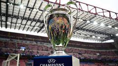 The UEFA Champions League trophy is displayed on the pitch prior to the UEFA Champions League semi-final second leg football match between Inter Milan and AC Milan on May 16, 2023 at tyhe Giuseppe-Meazza (San Siro) stadium in Milan. (Photo by Marco BERTORELLO / AFP)
