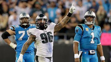 CHARLOTTE, NC - OCTOBER 12: Derek Barnett #96 of the Philadelphia Eagles celebrates after a play as teammates Matt Kalil #75 and Cam Newton #1 of the Carolina Panthers watch on during their game at Bank of America Stadium on October 12, 2017 in Charlotte, North Carolina.   Streeter Lecka/Getty Images/AFP == FOR NEWSPAPERS, INTERNET, TELCOS &amp; TELEVISION USE ONLY ==