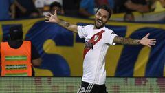 Argentina&#039;s River Plate player Ignacio Scocco celebrates after scoring his second goal against Boca Juniors during their Supercopa Argentina 2018 final football match at Malvinas Argentinas stadium in Mendoza, Argentina, on March 14, 2018. / AFP PHOTO / Andres Larrovere
