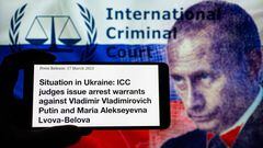 Vladimir Putin arrest warrant seen in press release from the International Criminal Court in The Hague. On 17 March 2023  in Brussels, Belgium. (Photo Illustration by Jonathan Raa/NurPhoto via Getty Images)