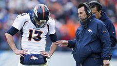 NASHVILLE, TN - DECEMBER 11: Head Coach Gary Kubiak and Trevor Siemian #13 of the Denver Broncos talk during a timeout against the Tennessee Titans at Nissan Stadium on December 11, 2016 in Nashville, Tennessee. The Titans defeated the Broncos 13-10.   Wesley Hitt/Getty Images/AFP == FOR NEWSPAPERS, INTERNET, TELCOS &amp; TELEVISION USE ONLY ==