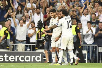 Mariano (centre) celebrates his goal in Real Madrid's 3-0 win over Roma, a performance which left Los Blancos' former star Luis Figo mighty impressed.