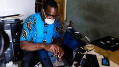 Charles, 42, computer repair, resumes work at his shop as Ghana lifts partial lockdown amid the spread of the coronavirus disease (COVID-19), in Accra, Ghana  April 20, 2020 Picture taken April 20, 2020. REUTERS/Francis Kokoroko