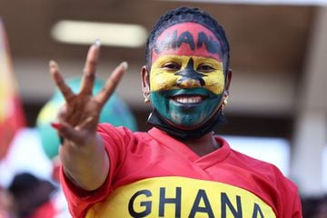 A Ghana's supporter poses during the Africa Cup of Nations (CAN) 2021 football match between Morrocco and Ghana at Ahmadou-Ahidjoe stadium in Yaounde, on January 10, 2022. (Photo by KENZO TRIBOUILLARD / AFP)