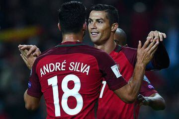 Cristiano Ronaldo and hat-trick hero Andre Silva.