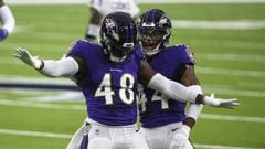 Sep 20, 2020; Houston, Texas, USA; Baltimore Ravens linebacker Patrick Queen (48) celebrates with cornerback Marlon Humphrey (44) after a play during the first quarter against the Houston Texans at NRG Stadium. Mandatory Credit: Troy Taormina-USA TODAY Sp