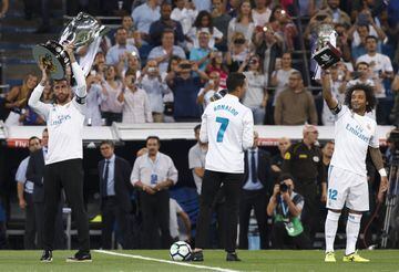 Sergio Ramos, Cristiano Ronaldo and Marcelo parade the LaLiga, UEFA Super Cup and Spanish Super Cup trophies.