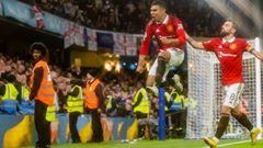 LONDON, ENGLAND - OCTOBER 22:   Casemiro of Manchester United celebrates scoring a goal to make the score 1-1 with Bruno Fernandes during the Premier League match between Chelsea FC and Manchester United at Stamford Bridge on October 23, 2022 in London, United Kingdom. (Photo by Ash Donelon/Manchester United via Getty Images)
