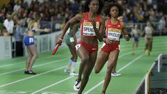 United States relay runners Ashley Spencer, left, and Courtney Okolo. 
