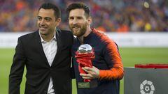 Xavi Hern&aacute;ndez y Leo Messi, excompa&ntilde;eros del Barcelona.