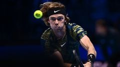 Russia's Andrey Rublev returns to Russia's Daniil Medvedev during their first round-robin match at the ATP Finals tennis tournament on November 14, 2022 in Turin. (Photo by Marco BERTORELLO / AFP)