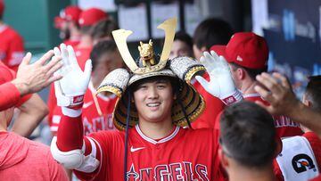 Jun 17, 2023; Kansas City, Missouri, USA; Los Angeles Angels designated hitter Shohei Ohtani (17) is congratulated by teammates after hitting a home run during the seventh inning against the Kansas City Royals at Kauffman Stadium. Mandatory Credit: Scott Sewell-USA TODAY Sports