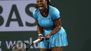 Serena Williams celebrates a point against Simona Halep. 