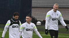 Bernardo Silva, Phil Foden y Erling Haaland, durante un entrenamiento con el City.