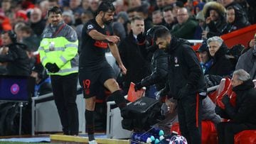 LIVERPOOL, ENGLAND - MARCH 11: Diego Costa of Atletico Madrid kicks a bunch of water bottles as he reacts to being subbed during the UEFA Champions League round of 16 second leg match between Liverpool FC and Atletico Madrid at Anfield on March 11, 2020 i