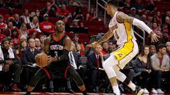 Dec 31, 2017; Houston, TX, USA; Houston Rockets guard Chris Paul (3) handles the ball while Los Angeles Lakers forward Kyle Kuzma (0) defends during the first quarter at Toyota Center. Mandatory Credit: Erik Williams-USA TODAY Sports