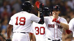 BOSTON, MA - SEPTEMBER 11: Brock Holt #12 of the Boston Red Sox celebrates with Jackie Bradley Jr. #19 after hitting a three run home run against the Toronto Blue Jays during the seventh inning at Fenway Park on September 11, 2018 in Boston, Massachusetts.  Maddie Meyer/Getty Images/AFP == FOR NEWSPAPERS, INTERNET, TELCOS &amp; TELEVISION USE ONLY ==
